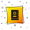 Black Jewish torah book icon isolated on white background. On the cover of the Bible is the image of the Star of David