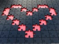 Black jigsaw heart puzzles