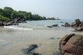 Black Johnson Beach in Sierra Leone, Africa with calm sea, ropcks, and deserted beach