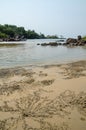 Black Johnson Beach in Sierra Leone, Africa with calm sea and sand patterns made by beach crabs