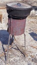 Black kettle for campfire on tripod Royalty Free Stock Photo