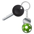 Black key with metallic soccer ball keyholder Royalty Free Stock Photo