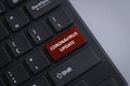 A black keyboard with red button written with Coronavirus Update as per current situation of Covid-19 pandemic virus outbreak Royalty Free Stock Photo