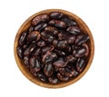 Black kidney bean in wooden bowl isolated on white background. Top view. Flat lay Royalty Free Stock Photo