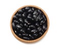 Black kidney beans in wooden bowl isolated on white background. top view Royalty Free Stock Photo