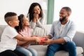 Black kids celebrating father's day, greeting daddy Royalty Free Stock Photo