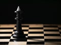 Black king chess piece on a chessboard. Chess match. The concept of a successful team work leader. Business strategy