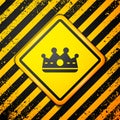 Black King crown icon isolated on yellow background. Warning sign. Vector