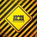 Black King crown icon isolated on yellow background. Warning sign. Vector