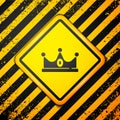 Black King crown icon isolated on yellow background. Warning sign. Vector