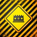 Black King crown icon isolated on yellow background. Warning sign. Vector