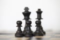 Black king and queen chess pieces with pawns Royalty Free Stock Photo