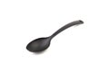 Black kitchen spoon utensils or kitchenware closeup Royalty Free Stock Photo