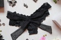 Black lace panties with big bow on a white background. Women`s A Royalty Free Stock Photo