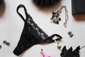 Black lace thongs on a white background. Women`s Accessories wit Royalty Free Stock Photo