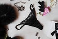 Black lace thongs on a white background. Women`s Accessories wit Royalty Free Stock Photo