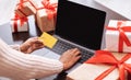 Black lady using computer and credit card at home Royalty Free Stock Photo
