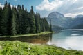 Black lake in the national park Durmitor and mountains in the ba Royalty Free Stock Photo