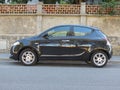 Black Lancia Ypsilon car in Cagliari