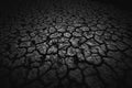 Black land, humus, covered with deep cracks in the dark. Tilt-shift Royalty Free Stock Photo