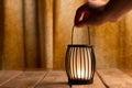 Black lantern with a candle Royalty Free Stock Photo