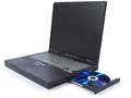 Black laptop and DVD Royalty Free Stock Photo