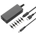 Black laptop power adapter with multiple connector tips and USB cable laptop charger AC adapter Royalty Free Stock Photo