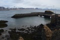 Black Lava Rocks Along the Coast of Hellnar Iceland