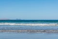 Black lava rocks and water waves of Atlantic ocean, nature landscape on Lanzarote, Canary islands, Spain Royalty Free Stock Photo