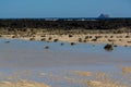 Black lava rocks and water waves of Atlantic ocean, nature landscape on Lanzarote, Canary islands, Spain Royalty Free Stock Photo