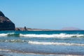 Black lava rocks and water waves of Atlantic ocean, nature landscape on Lanzarote, Canary islands, Spain Royalty Free Stock Photo