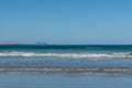 Black lava rocks and water waves of Atlantic ocean, nature landscape on Lanzarote, Canary islands, Spain Royalty Free Stock Photo