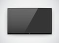 Black LCD or LED tv screen hanging on a wall Royalty Free Stock Photo