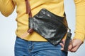 Black leather bag on woman waist Royalty Free Stock Photo