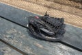 Black leather baseball glove on the bench batters fence casting Royalty Free Stock Photo