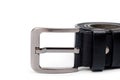 Black leather belt with a classic metal buckle for men`s trousers and jeans Royalty Free Stock Photo