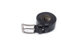 Black leather belt with a classic metal buckle for men`s trousers and jeans Royalty Free Stock Photo