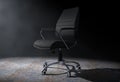 Black Leather Boss Office Chair in the Volumetric Light. 3d Rend