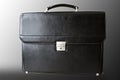 Black leather briefcase isolated on black and white background Royalty Free Stock Photo