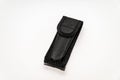 Black leather case for a pocketknife isolated on a white background Royalty Free Stock Photo