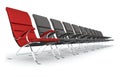 Black leather chairs with red chair leading Royalty Free Stock Photo