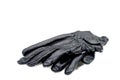 Black leather gloves on snow Royalty Free Stock Photo