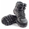 Black leather hiking boots with padded collar and rugged sole, isolated on white background.