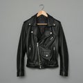 Black leather motorcycle jacket with a stylish design, featuring silver zippers and Royalty Free Stock Photo