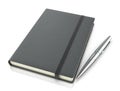 Black leather notebook and a silver pen Royalty Free Stock Photo