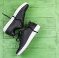 Black leather sneakers with laces Royalty Free Stock Photo