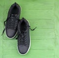 Black leather sneakers with laces Royalty Free Stock Photo