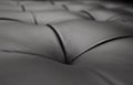 Black leather sofa close up Royalty Free Stock Photo