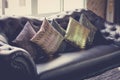 Black leather sofa in luxurious interior room Royalty Free Stock Photo