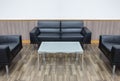 Black leather sofa set in the living room Royalty Free Stock Photo